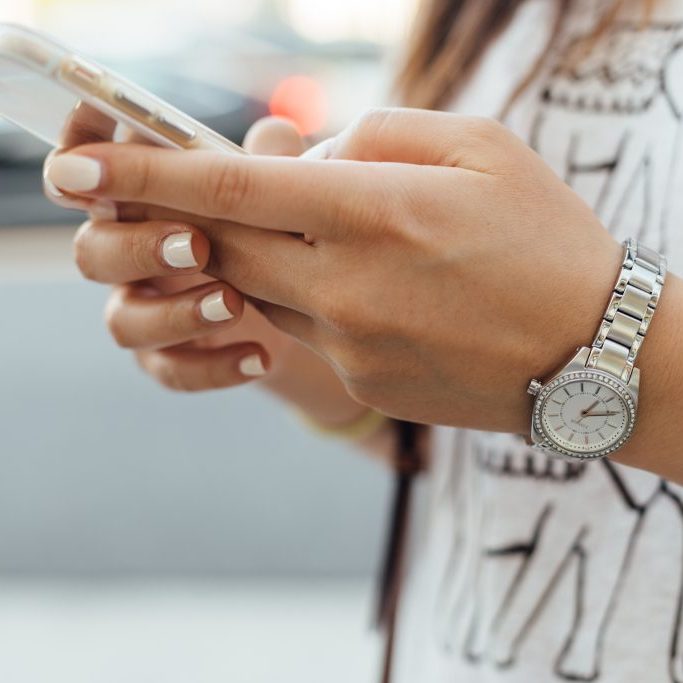 Girl using phone Girl texting on phone