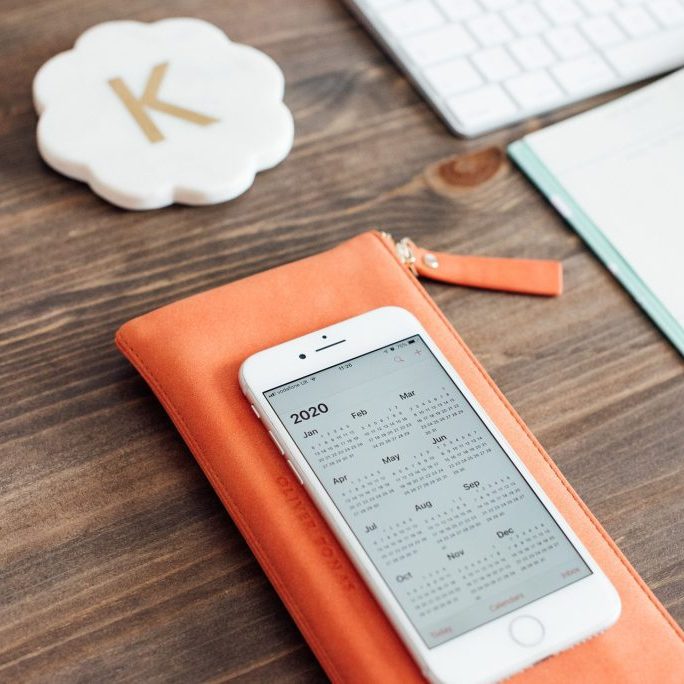 Kellie-Simpson-VA-Virtual-Assistant-Legal-Support-Web-47 Desk with iphone showing 2020 calendar and daily planner