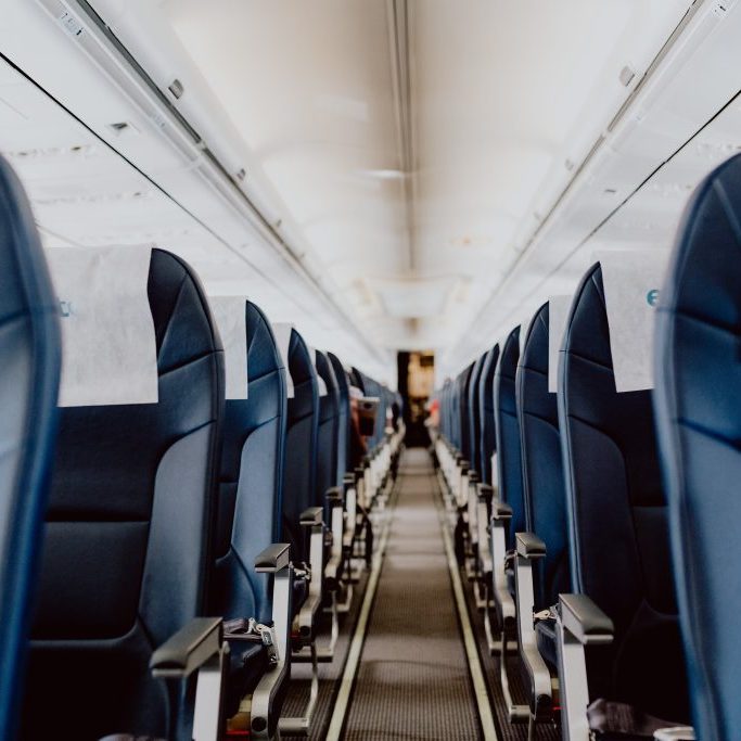 kaboompics_Empty airplane seats in the cabin Empty airplane seats in teh cabin