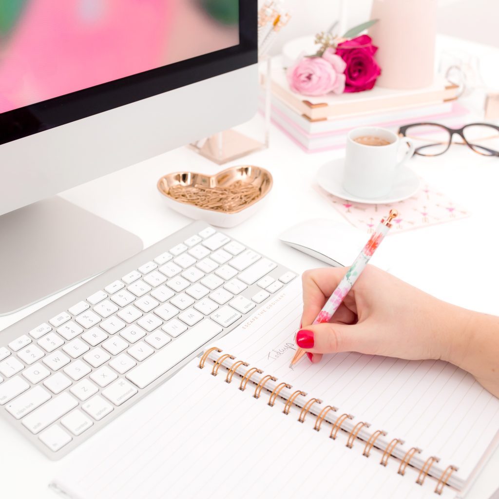 woman writing to do list